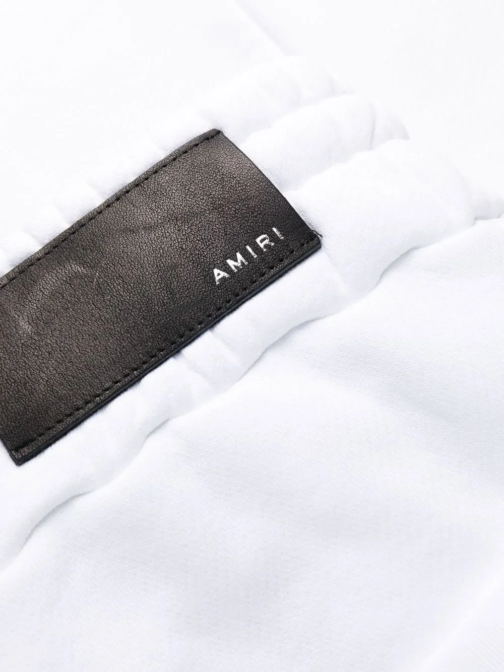 AMIRI logo-patch track pants